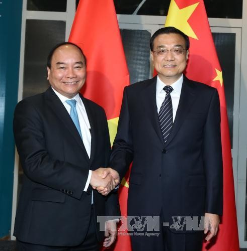 Нгуен Суан Фук встретился с премьером Госсовета КНР и президентом Болгарии  - ảnh 1
